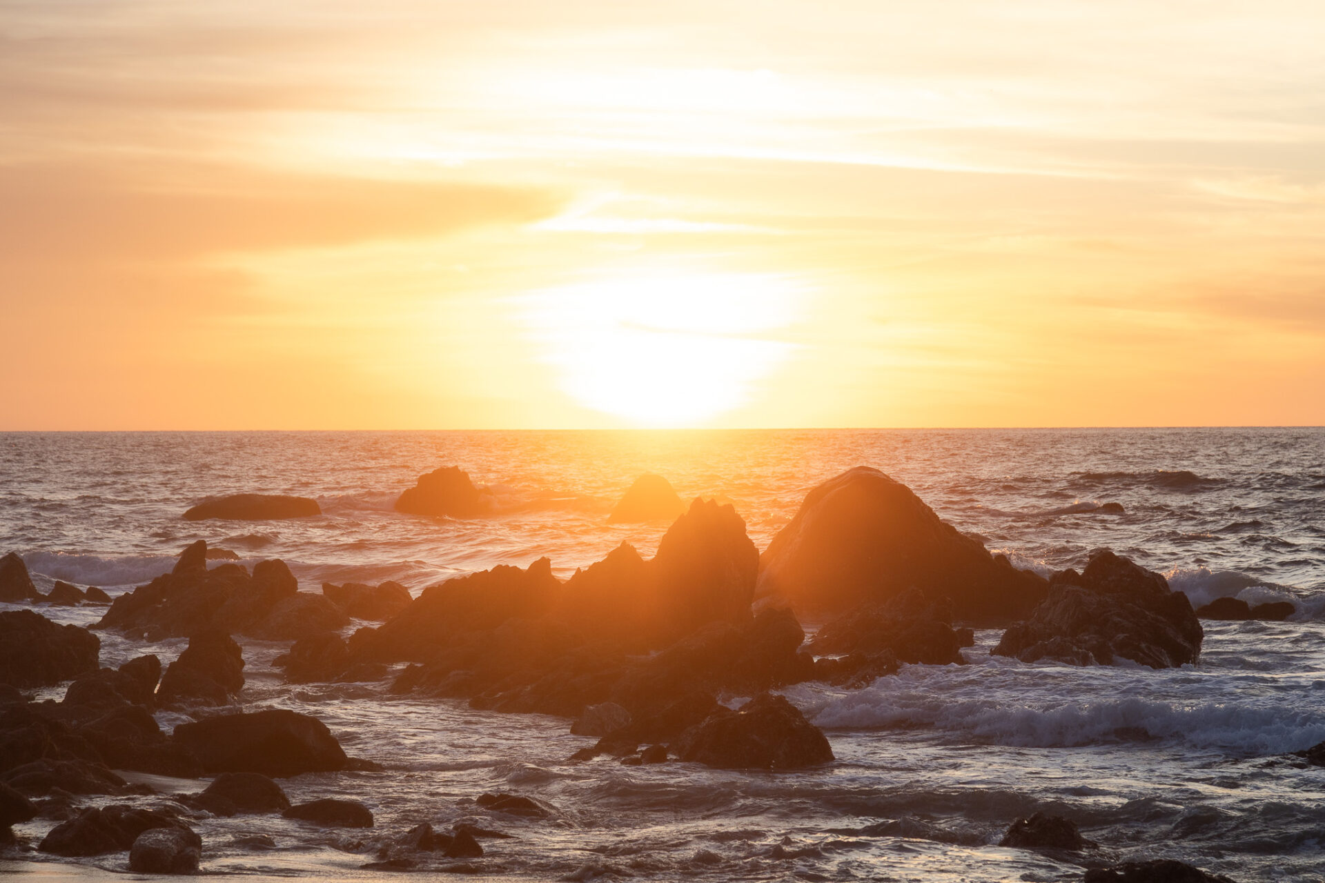 sunset in sayulita black sand beach 